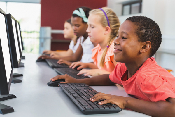 bigstock-School-kids-using-computer-in--171602789_600x